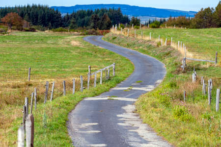 Country road in Haute-ArdÃ¨che in France in autumn on the Plateau du Lignonの写真素材