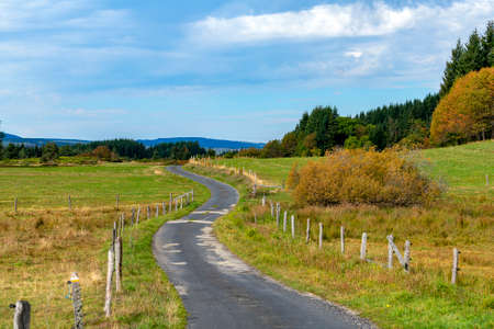 Country road in Haute-ArdÃ¨che in France in autumn on the Plateau du Lignonの写真素材