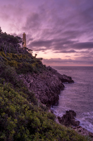 Seascape on the rocky Malalongue headland of Cap Ferrat on the French Riviera at sunrise in winterの写真素材