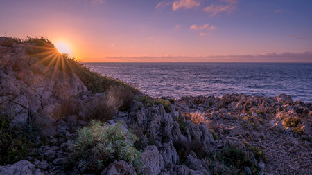 Seascape on the rocky Malalongue headland of Cap Ferrat on the French Riviera at sunrise in winter
