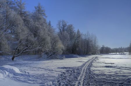 Snow ski road on a frozen lake. North of Russiaの写真素材