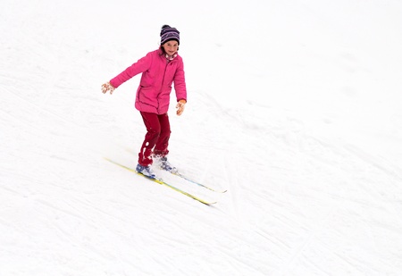Bright girl Skiingの写真素材