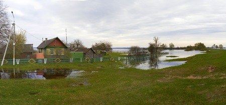 Spring panorama with the river in flood cloudy day Belarusの写真素材