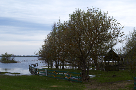 Spring panorama with the river in flood cloudy day Belarusの写真素材