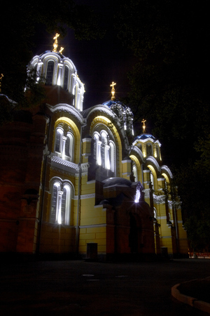 Volodomirskiy Church at night in Kiev, Ukraineの写真素材