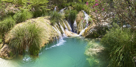 Natural waterfall and lake in Polilimnio area. Greeceの写真素材