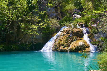 Natural waterfall and lake in Polilimnio area. Greeceの写真素材