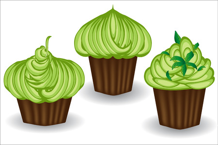 Three cupcakes with green cream, berries and powder. Sweet, dessert, deliciousの写真素材