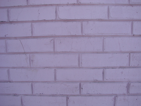 purple grunge brick room wall background texture.の写真素材