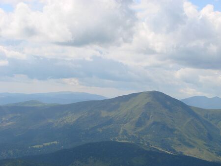 The picture was taken from the mountain Goverla. The photo view of the clouds and the Carpathian...
