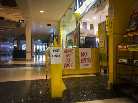 CHELTENHAM, AUSTRALIA - 23 MARCH 2020: Southland Shopping Centre during COVID-19 pandemic. Wage earners are deeply affected by the economic downturn during the lockdown to prevent the virus spreadingのeditorial素材
