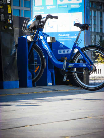 SOUTHBANK, AU - 25 SEPT 2018: Melbourne blue bike share station. The bikes were ubiquitous across...