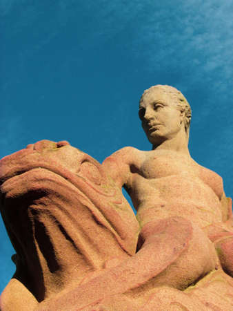11 Sept 2018 - East Melbourne, AU: Mermaid and fish statue made of Pyrmont stone. The sculptor,...