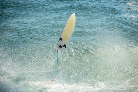 Surfboard, Surfboard on a wave, surfboard in flightの写真素材