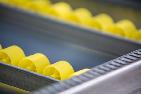 Industrial conveyor rollers in warehouse productionの写真素材