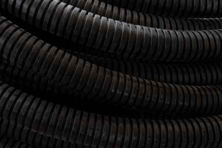 Close-up of black industrial corrugated hosesの写真素材