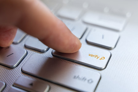 Finger On Verify Keyboard Button Key To Press Online For Security Authentication, Macro Closeup Workflowの写真素材