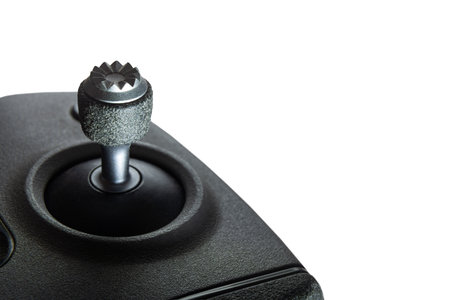 Joystick Control Lever On Black Console Isolated On White Background, Precision Navigation Input Device Technologyの写真素材