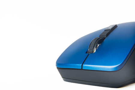 Blue Wireless Computer Mouse Isolated On White Background With Copy Space, Minimal Office Technology Background For Web Banner Designの写真素材