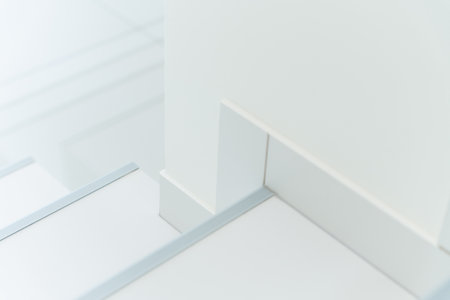 White Staircase Corner With Minimalist Finishing Details For Modern Interior Architecture Useの写真素材