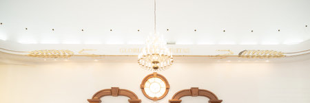 Bright Chandelier And Ornamental Details Inside Elegant Church Interiorの写真素材