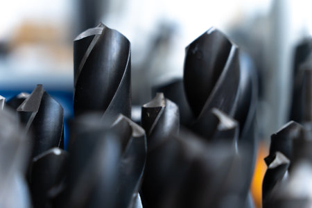 Assorted Drill Bits In Industrial Workshop Showing Sharp Cutting Edges And Precision Engineering Toolsの写真素材