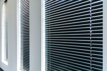 Closed Window Blinds With Horizontal Slats In Bright Modern Interiorの写真素材