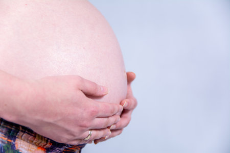 Pregnancy Belly Of Woman With Hands Maternity Baby Motherhood Expectation Family And Parenthood Conceptの写真素材