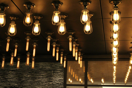 Light bulbs hanging from ceiling bring relaxed atmosphere