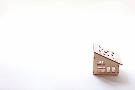 Cute miniature house made of woodの写真素材
