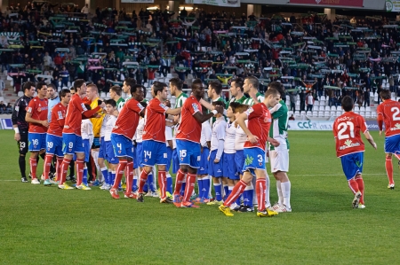 CORDOBA, SPAIN - JANUARY 13:Players  initial alignment during match league Cordoba(W) vs Numancia (R)(1-0) at the Municipal Stadium of the Archangel on January 13, 2013 in Cordoba Spain のeditorial素材