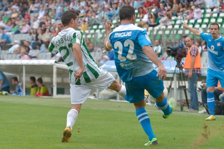 CORDOBA, SPAIN - SEPTEMBER 29:  Carlos Caballero W(21) in action during match league Cordoba (W) vs Girona (B)(2-0) at the Municipal Stadium of the Archangel on September 29, 2013 in Cordoba Spainのeditorial素材