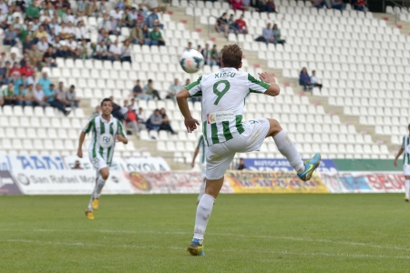 CORDOBA, SPAIN - SEPTEMBER 29: Xisco W(9) in action during match league Cordoba (W) vs Girona (B)(2-0) at the Municipal Stadium of the Archangel on September 29, 2013 in Cordoba Spainのeditorial素材