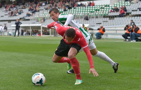 CORDOBA, SPAIN - MARCH 29:  Pinillos W(29) in action during match league  Cordoba (W) vs Murcia (R)(1-1) at the Municipal Stadium of the Archangel on March 29, 2014CORDOBA, SPAIN - MARCH 29:  Pedro W(15) in action during match league  Cordoba (W) vs Murciのeditorial素材