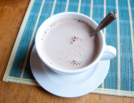 Hot chocolate in cup on tableの写真素材
