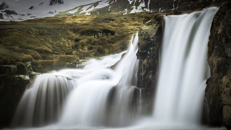 The Waterfall near the mountain Kirkjufellの写真素材