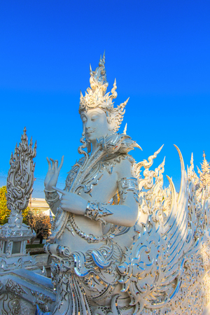 White statue inside wat rong khunの写真素材