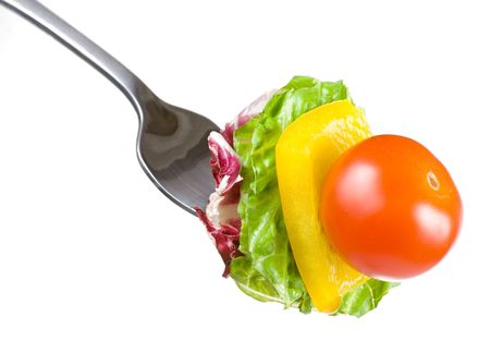 Tomato, Lettuce and Bell Pepper on a Fork Againts Whiteの写真素材