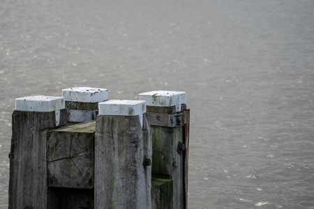 Hardwood dukdalf to moor ships. These are often found in ports or at locks in waterways