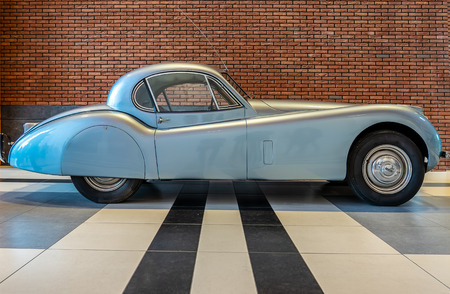 THE HAGUE/NETHERLANDS-JUNE 24, 2018: side view of a classic jaguar XK 120 roadster. This is a very rare copy of this car. It was seen at a classic car meetingのeditorial素材