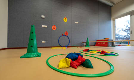 Play equipment and toys in an indoor playground in a school for the youngest childrenのeditorial素材