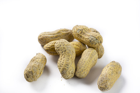 Closeup bunch of peanuts on a white background