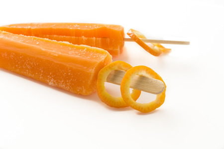 Closeup of colorful twin pops on a white background.の写真素材