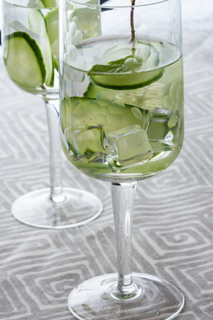 Closeup of glasses of cucumber, mint infused waterの写真素材