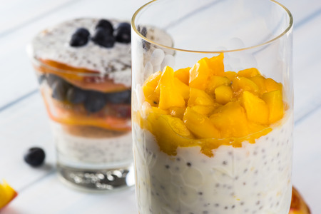 Close up of  mango chia seed yogurt parfait.の写真素材