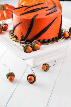 Close up of orange topping, butter cream cake for Halloween Party.の写真素材