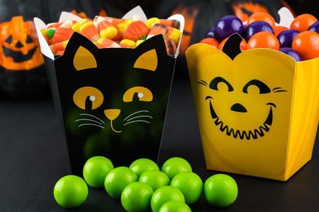 Close up of assorted  candies in Halloween treat boxes.の写真素材