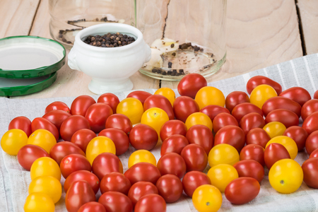 Close up of washed cherry tomatoes prepared for tomatoes pickles.の写真素材