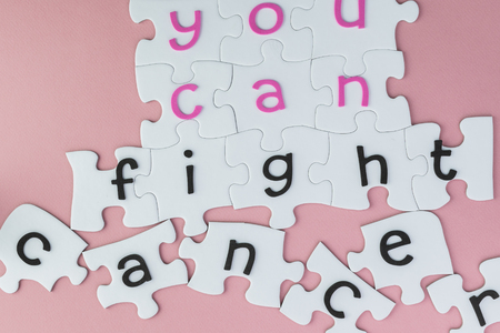 Complete puzzle with fight cancer inspirational quote about breast cancer.の写真素材