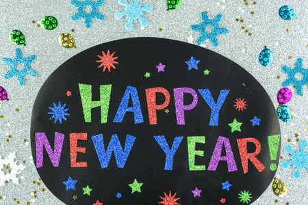 Happy New Year sparkling background with snowflake, stars.
